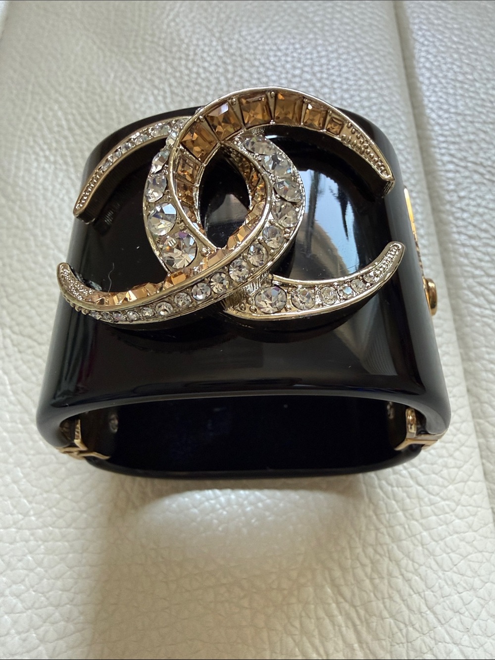 CHANEL Black Resin Cuff Bracelet with Crystal-Embellished CC and Gold Accents